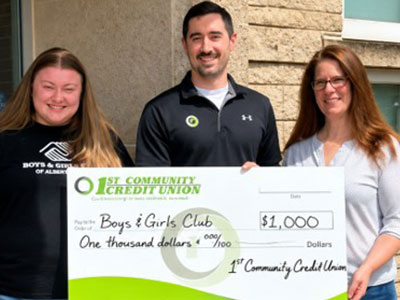 donation check presentation from 1st CCU to Tomah Boys & Girls Club