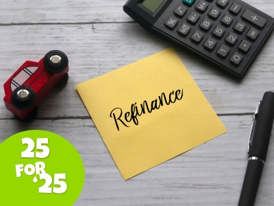 toy car, calculator, pen, and sticky note on a table. 25 for '25 tips for refinancing