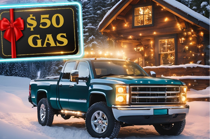 Holiday lights on cabin, $50 Gas card, blue truck on snow