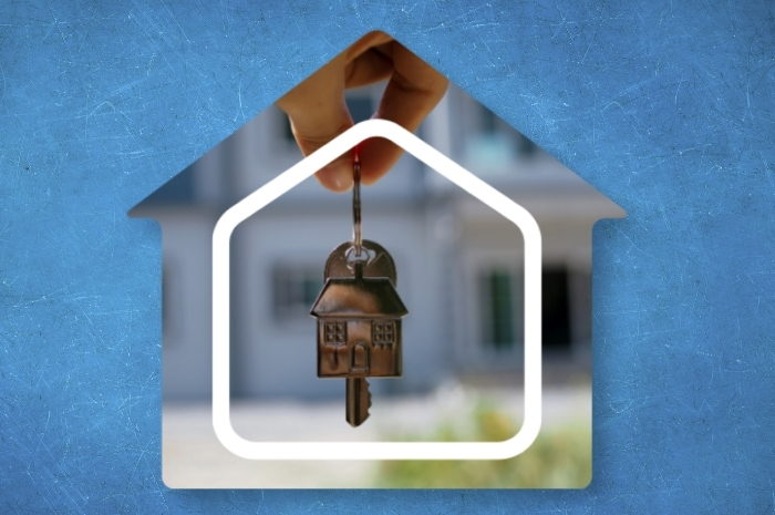 keys to a new home inside the outline of a house shape