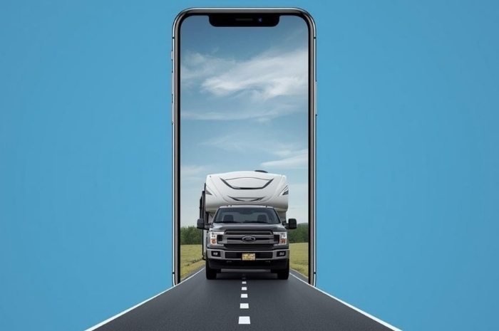 concept image of truck towing camper driving out of a smart phone screen