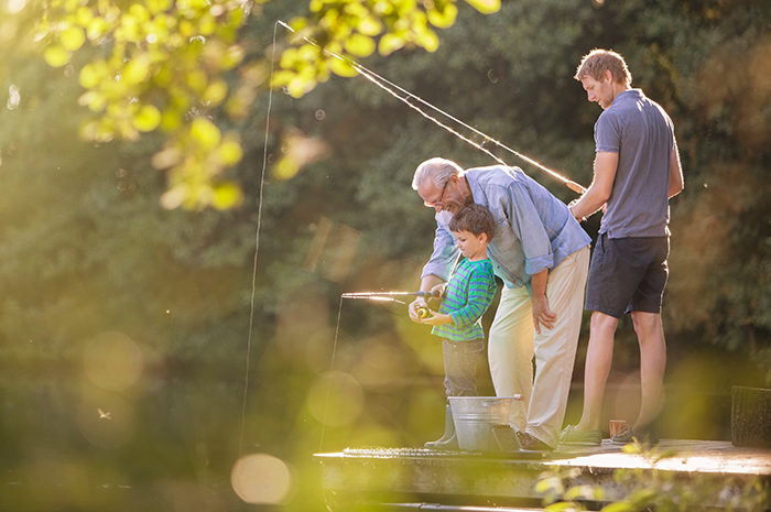 Grandfather, Son, and Grandson fishing together